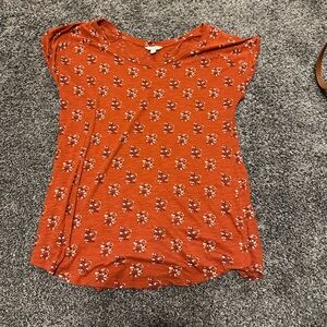 Small orange blouse great for a comfy work shirt